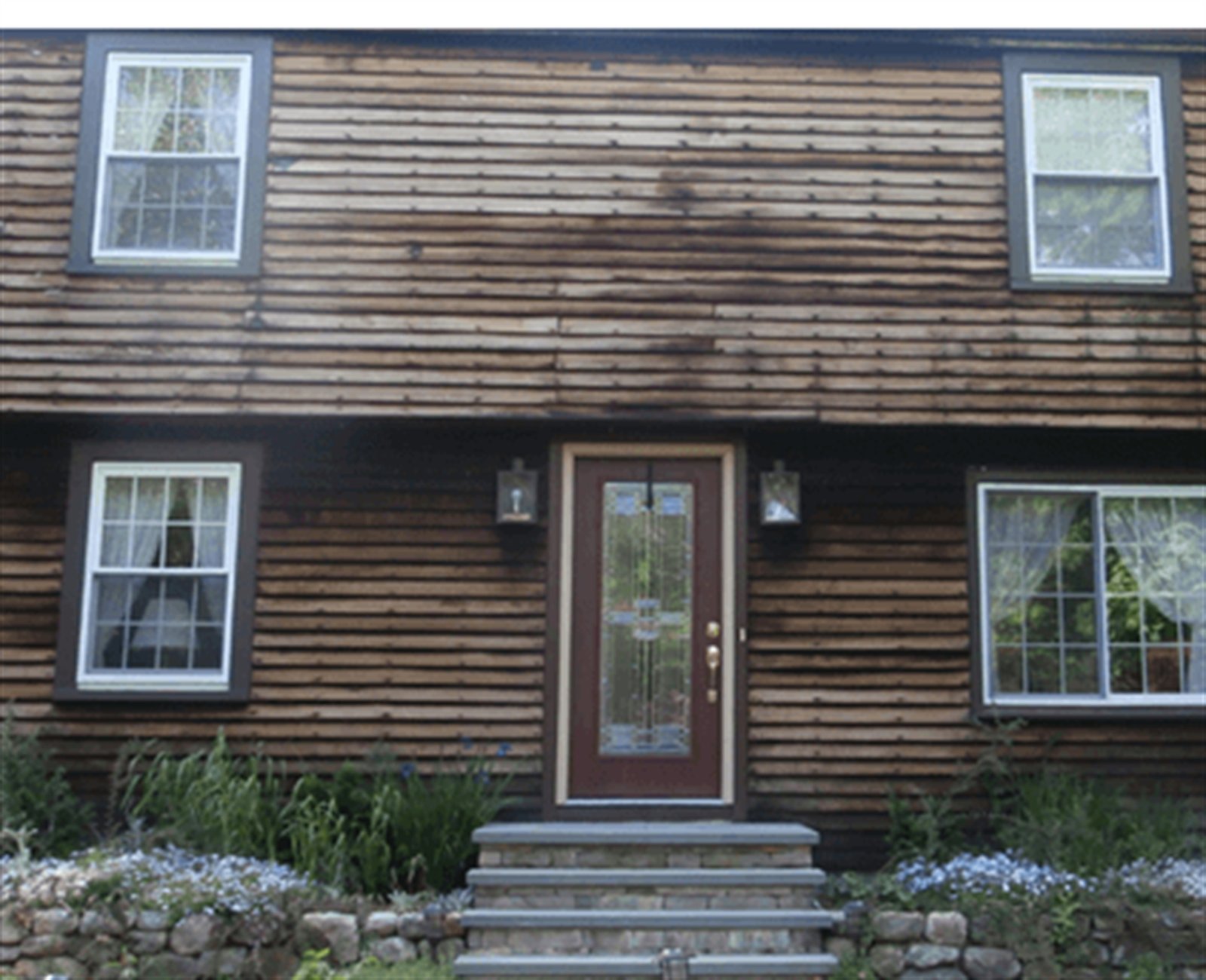 Full siding renovation with dormers